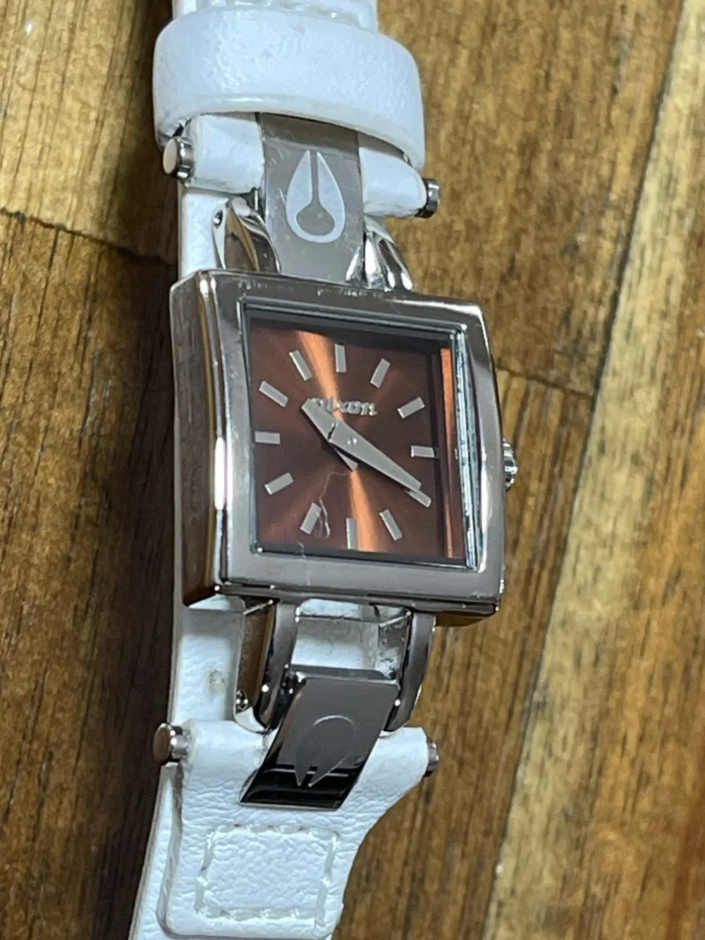 Nixon Matchmaker Women’s Square Watch with Metallic Orange Dial and White Strap